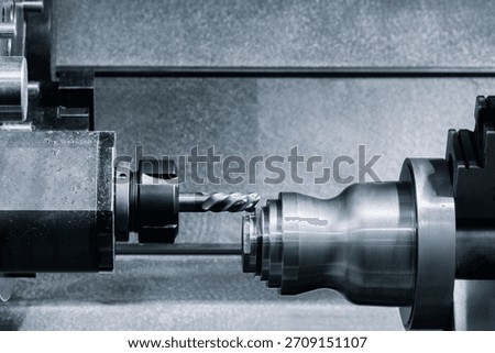 Modern programmable metalworking CNC multifunctional milling drilling grinding tool automatic machine, industrial concept background.
