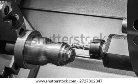 Modern programmable metalworking CNC multifunctional milling drilling grinding tool automatic machine, industrial concept background.