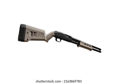Modern pump-action shotgun with a plastic butt and fore-end isolate on a white background. Weapons for sports and self-defense. Armament of police, army and special units.