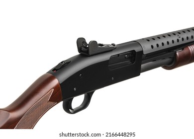Modern pump-action shotgun with a wooden butt and fore-end isolate on a white background. Weapons for sports and self-defense. Armament of police, army and special units.