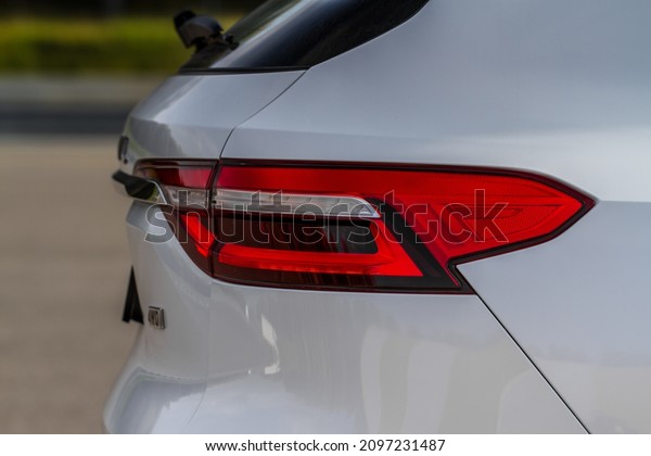 Modern rear light of a\
car. Brake light and arrow of large suv. Rear light of car close up\
view. Tail light.