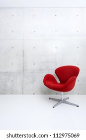 Modern Red Chair And Concrete Wall