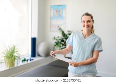 Modern rehabilitation physiotherapy woman worker at job with - Shutterstock ID 2155733481