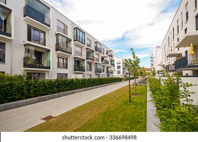 Modern residential buildings with outdoor facilities, Facade of new low-energy houses - Shutterstock ID 336698498