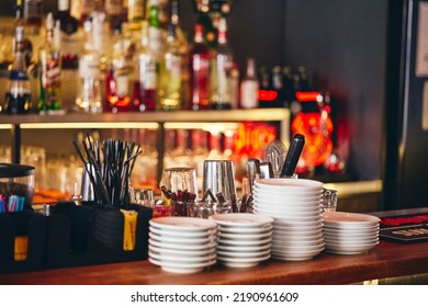 Modern Restaurant Interior, Bar Counter With Tableware.