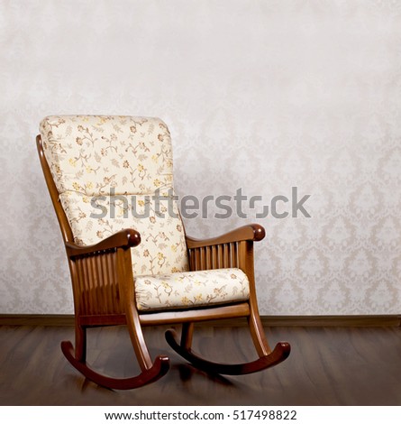 modern rocking chair near a light wall