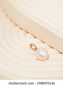 The modern romantic pearl jewelry includes unique pendants beige background  Minimalism concept