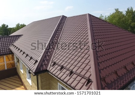 Similar – Image, Stock Photo Corrugated tiles in red-brown on the tiled roof of an old building on the grounds of the industrial museum in the Lage brickworks in the province near Detmold in East Westphalia-Lippe