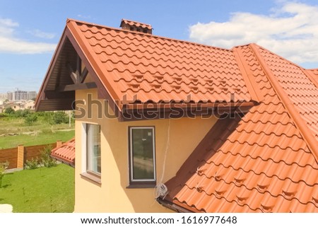 Similar – Image, Stock Photo Corrugated tiles in red-brown on the tiled roof of an old building on the grounds of the industrial museum in the Lage brickworks in the province near Detmold in East Westphalia-Lippe