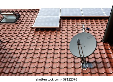modern roof with satellite dish and solar panels