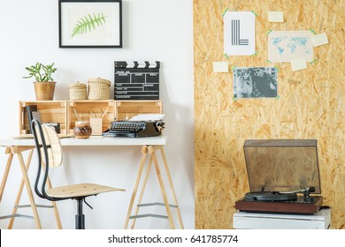 Modern Room With Desk, Record Player, Posters And Osb Board