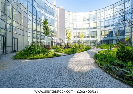 Modern round office building with garden