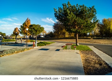 A modern RV campground full hookup camping slot - Shutterstock ID 1216675885