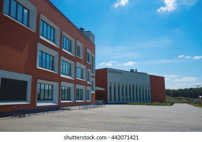 Modern School Building. Empty School Yard. Sunny Day, Blue Sky.