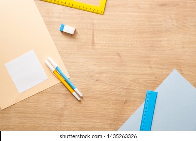 Modern School Supplies On Wooden Desk Table Background. Back To School Concept. Flat Lay, Top View. 