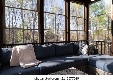 Modern Screened Porch In Springtime, Full Of Blooms Trees In The Background. New Home Addition Concept.