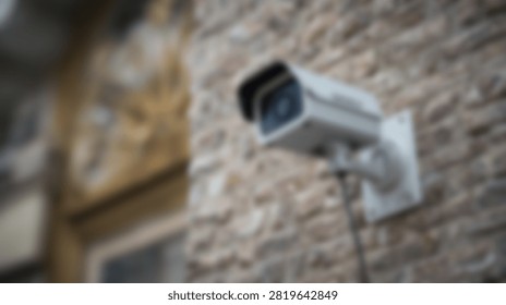 A modern security camera is attached to a rough stone wall, representing surveillance and safety measures.