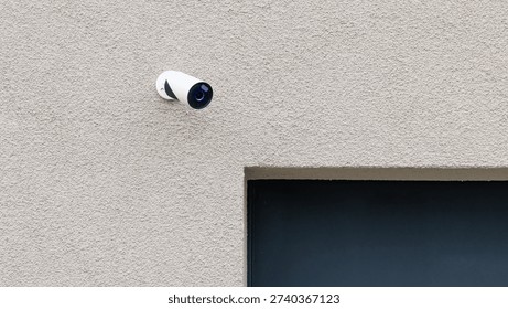 Modern Security Camera on Facade Wall