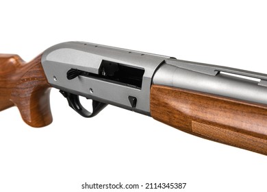A modern semi-automatic shotgun with a wooden stock and a silver barrel. Weapons for hunting and sports. Isolate on a white background.