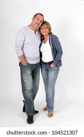 Modern Senior Couple Standing On White Background