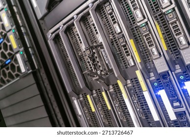 A modern server rack showcasing advanced technology in a data center environment. This image depicts intricate hardware design, showcasing efficient data storage and processing capabilities.