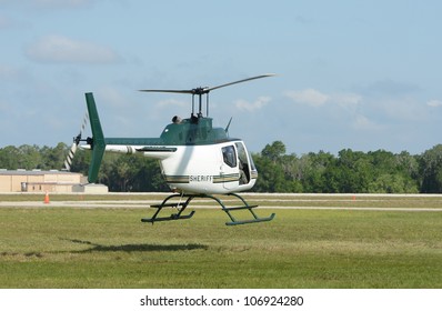 Modern Sheriff Department Helicopter Departing On Patrol