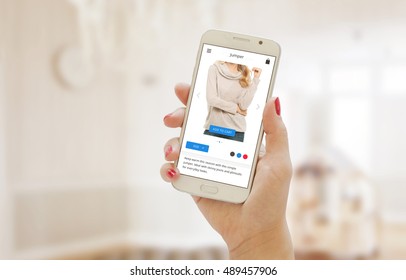 Modern Shopping App On Smart Phone In The Women Hand. Buying Clothes On Web Site Or App.