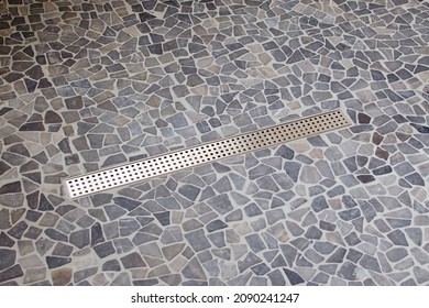 Modern Shower Drain On Stone Floor