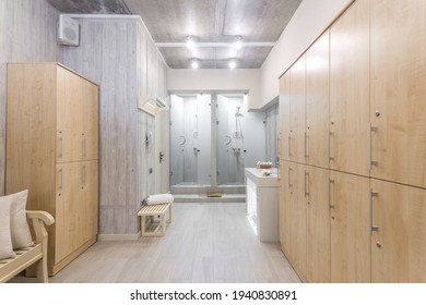 Modern shower room interior with wardrobes - Shutterstock ID 1940830891