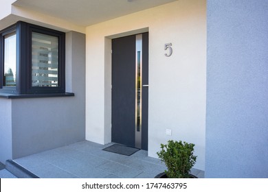 A modern single family house with a entrance doors