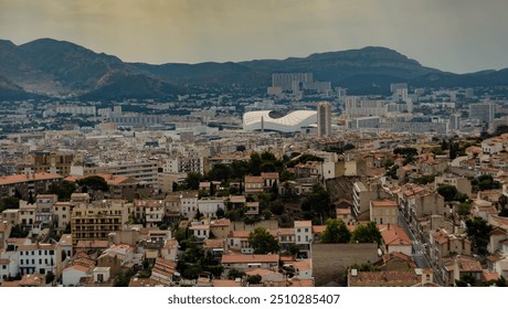 Modern Skyline with Mountain Backdrop