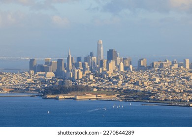 Modern skyscrapers on San Francisco skyline with sailboats off Marina
