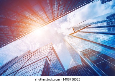 Modern skyscrapers rising to the sky. Sun flare - Shutterstock ID 1408738523