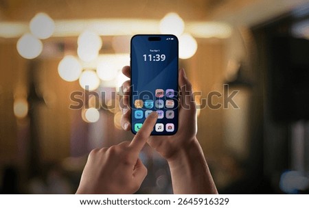 Modern smartphone app interface tapped in vibrant nightlife setting, showcasing intuitive user interaction with mobile UI.