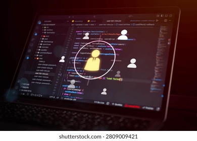 Modern software development concept showing source code interface with user icons overlay, representing user management system, data access, cybersecurity, programming workflow, and digital technology network.
