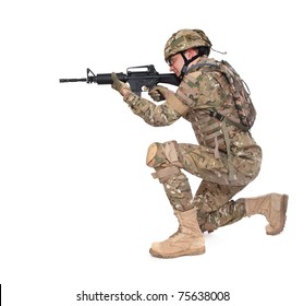 Modern Soldier With Rifle Isolated On A White Background