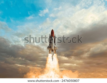 Modern space rocket in beautiful cloudy sky
