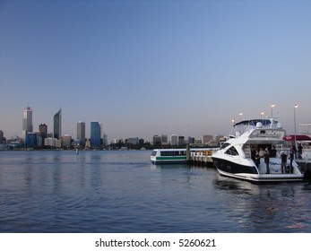 Modern Speedboat Parking, Against Modern City Skyline At Sunset , Australia -Perth