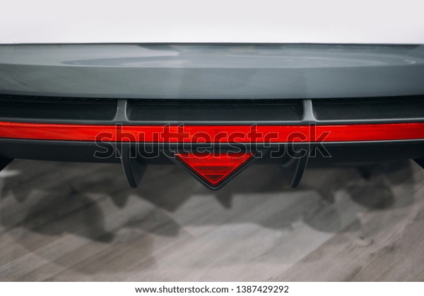 Modern sport\
car rear bumper skirt with\
reflector