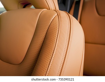 Modern Sport Car  Red Sand Perforated Leather Interior. Part Of  Leather Car Headrest Seat Details.