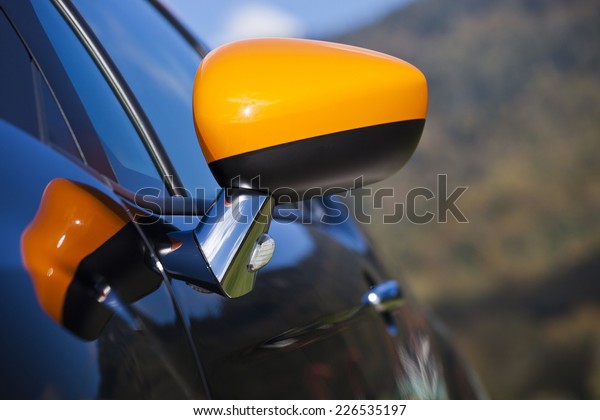 Modern sports car rear view\
mirror