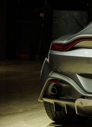 Modern Sports Car Tail Light And Exhaust Pipe Rear View