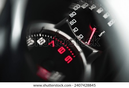 Modern Sports Vehicle Speedometer and RPM Meter Close Up.