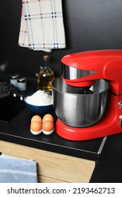 Modern Stand Mixer And Ingredients On Countertop In Kitchen. Home Appliance