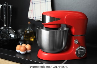 Modern Stand Mixer And Ingredients On Countertop In Kitchen. Home Appliance