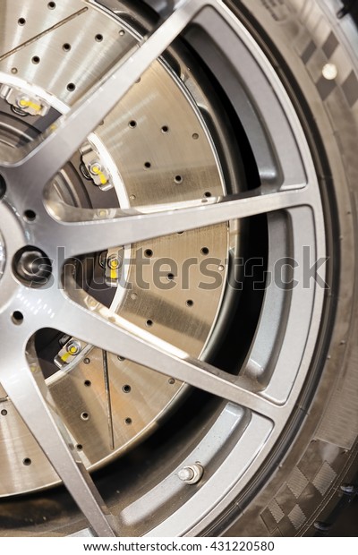 Modern steel car wheel with\
new tyre