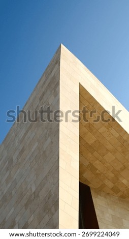 Modern stone building with angular geometric shape