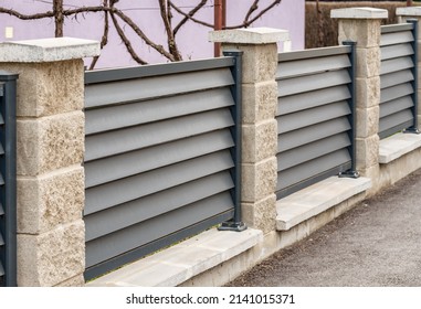 Modern Stone Fence With Aluminum  Or Metal Shutters