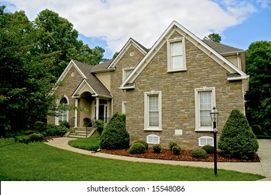 Modern Stone House With Well Kept Yard.