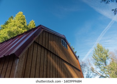 Modern Storage Shed With Blue Background